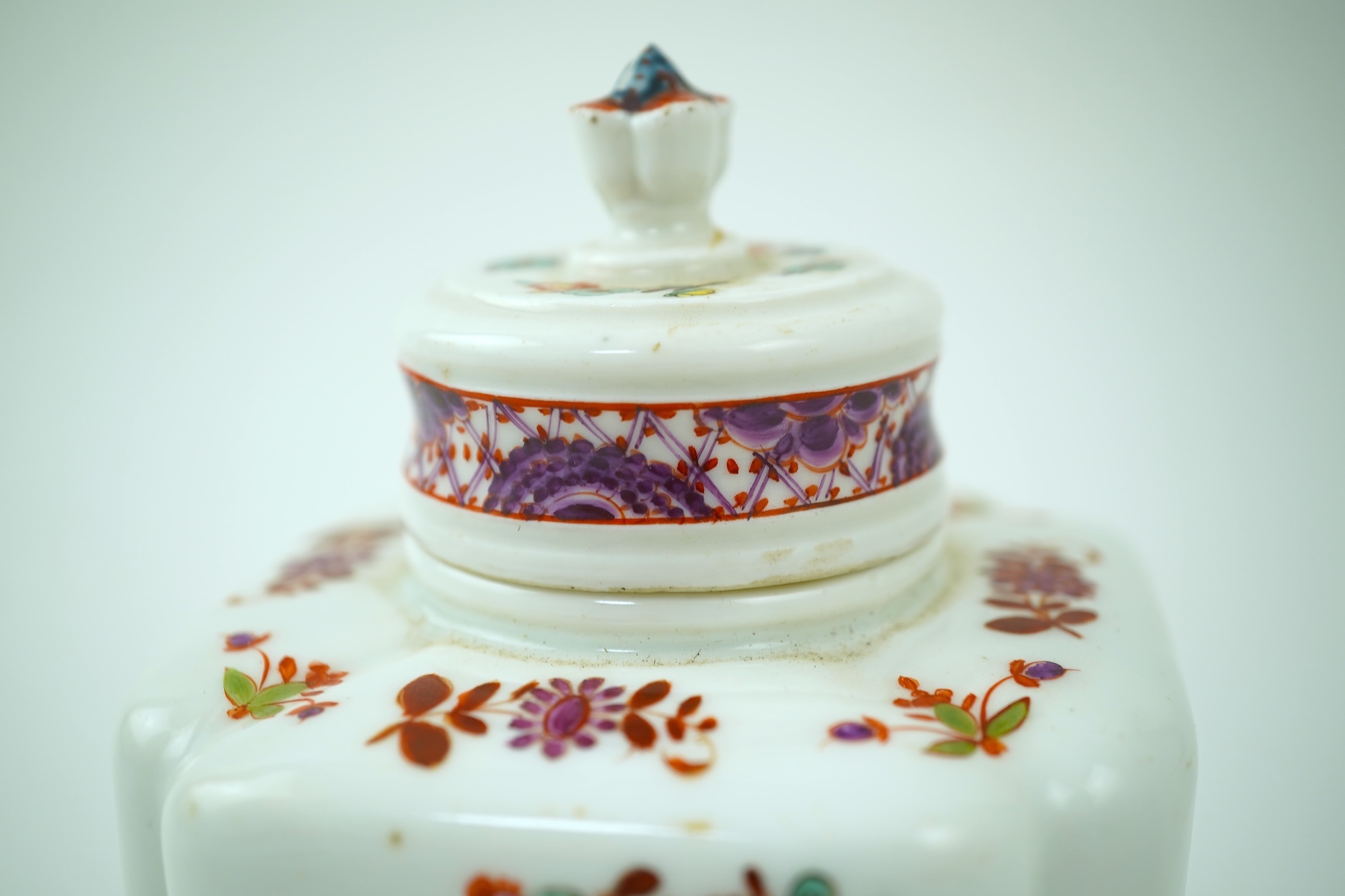 A Meissen polychrome tea caddy and cover, c.1760